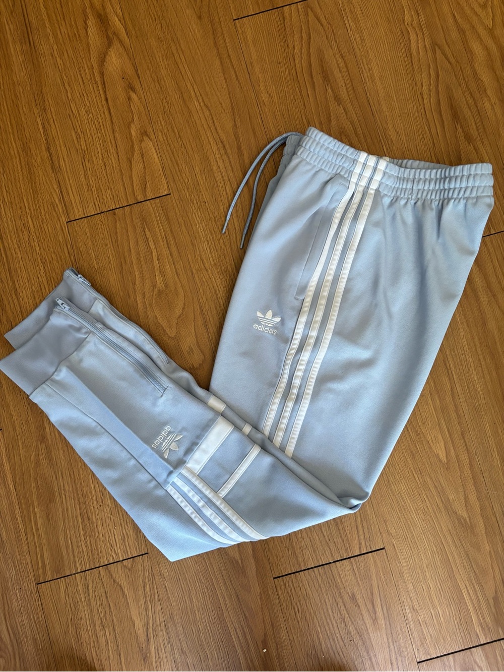 adidas Light Blue women’s 3-Stripe Joggers. Classic trifold logos make it pop!!